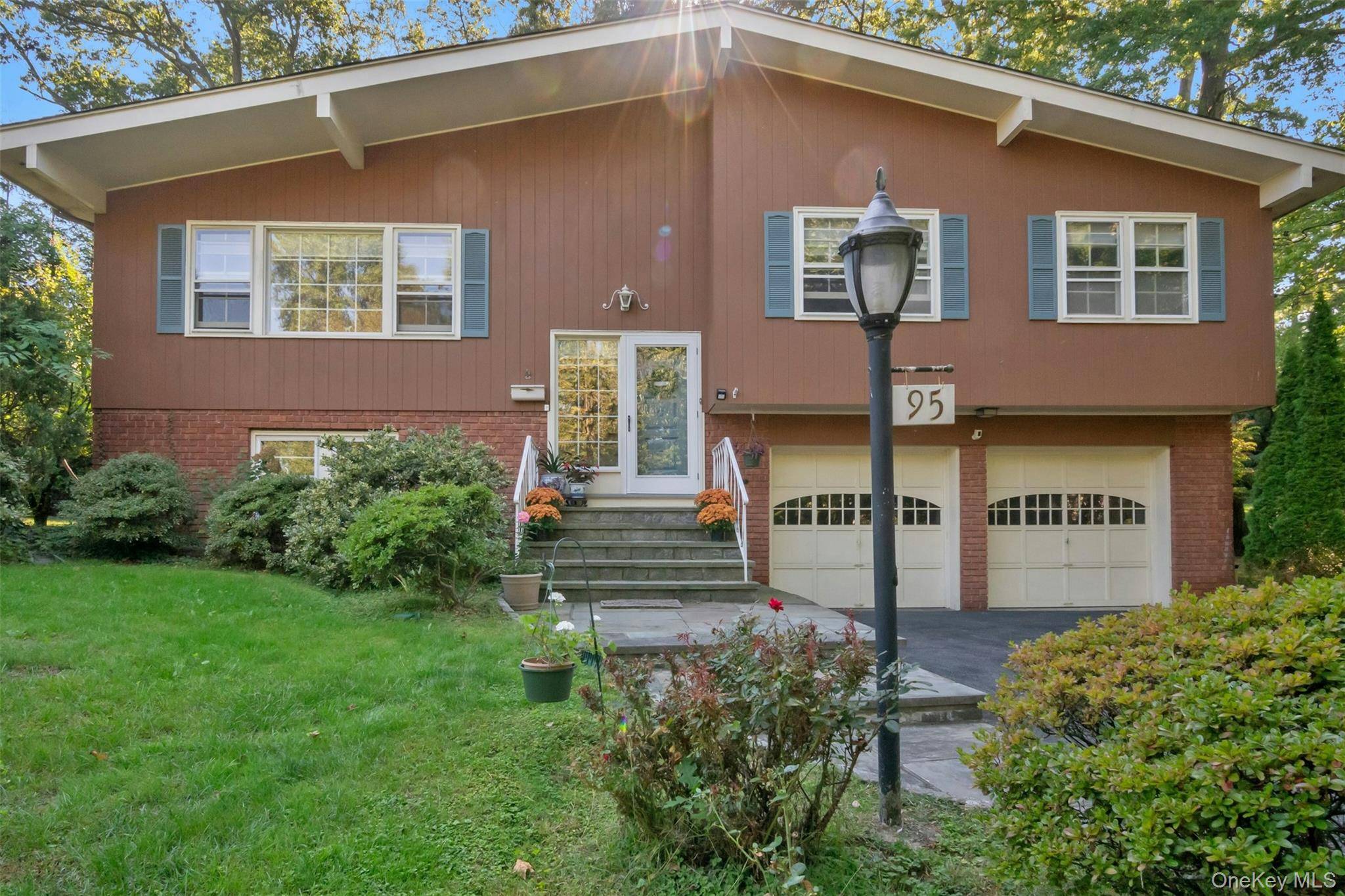 Step up a few stairs and then enjoy the ease of one level living and the appeal of an open concept design with vaulted ceilings and plenty of light.