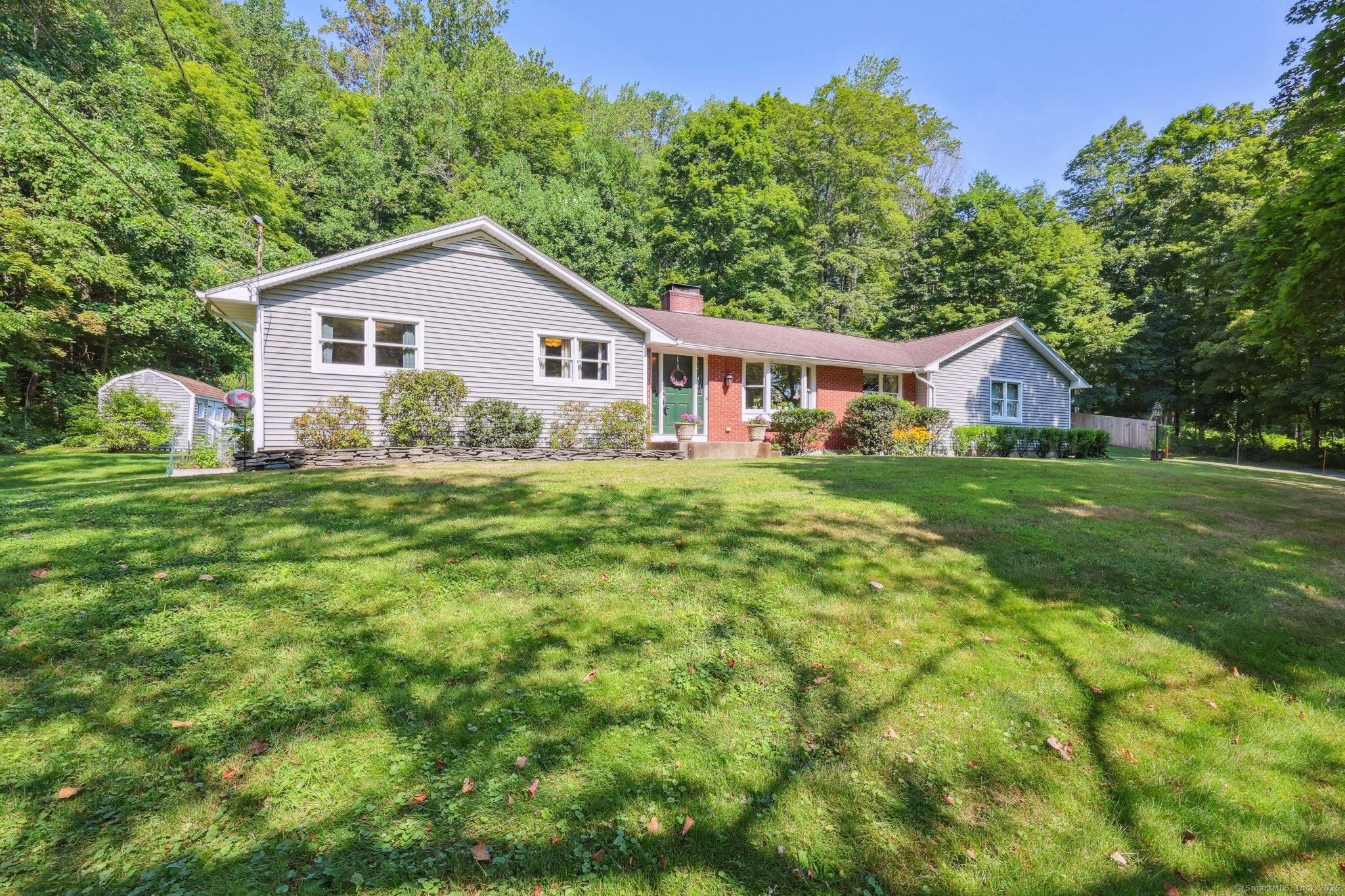 Price improvement ! Make this 3 Bedroom Home on a Private Lot with Dual Garages your new oasis !