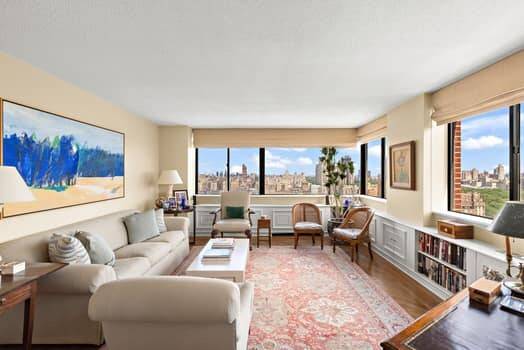 Welcome to 45 West 67th Street, Unit 29A, where urban living meets serene comfort in this impressive post war high rise coop.