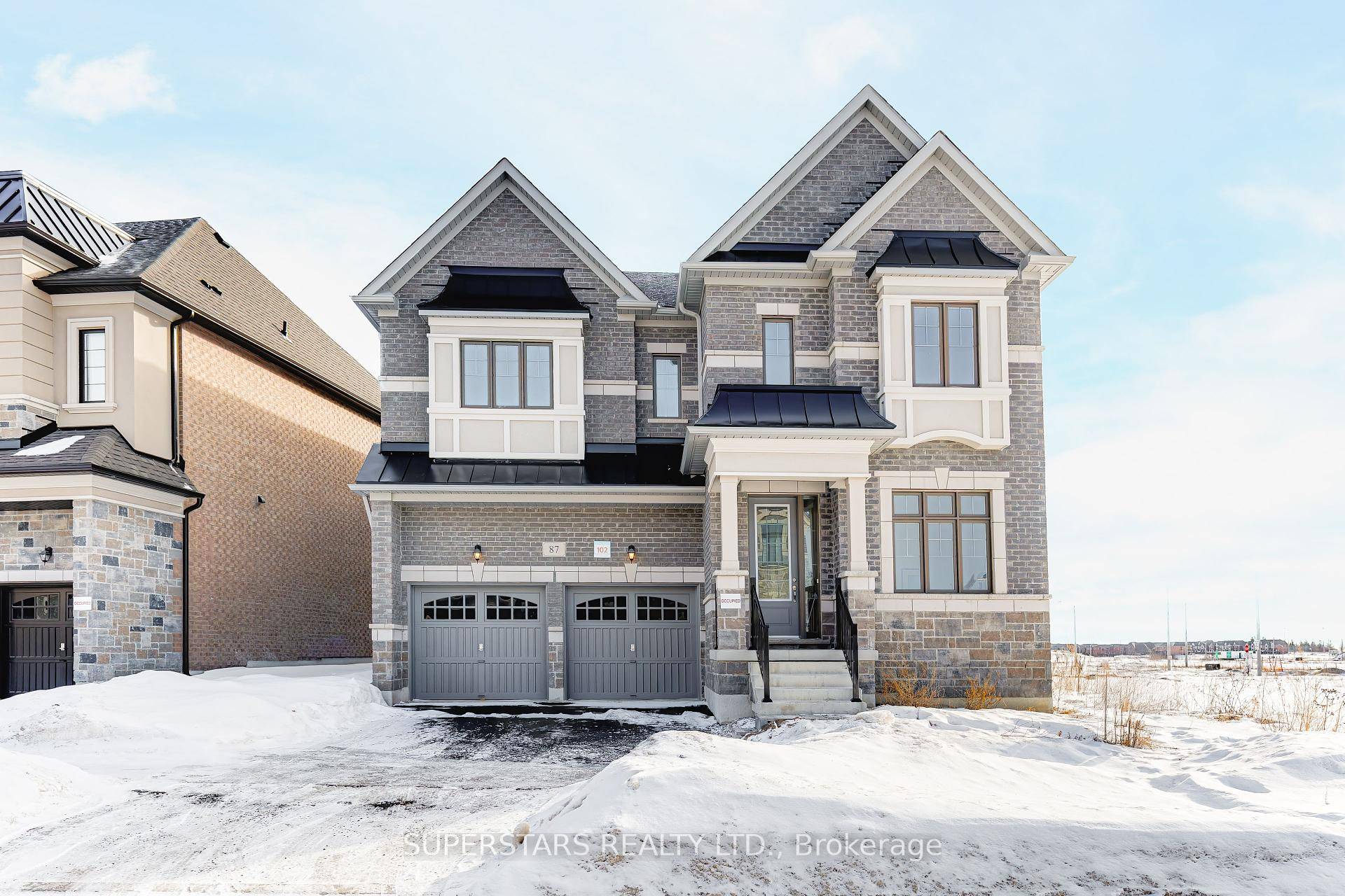 Elegant 5 Bedrooms 5 Bathrooms Luxury Home On 52 x 90 Ft Premium Lot Boasts An Unobstructed South View.