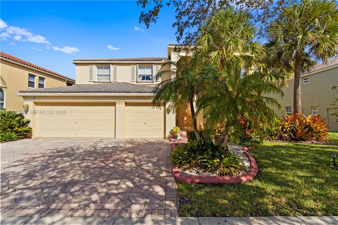 Step into refined Miramar living at this elegant 5 bedroom plus office residence located in an exclusive gated community.