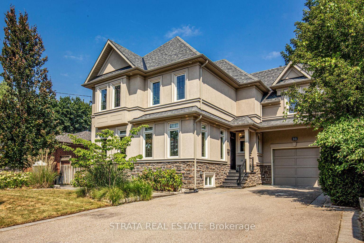 Welcome to 33 Shadwick Drive, a fully renovated 4 bedroom, 4 bathroom home that has been rebuilt from the studs with no detail overlooked.