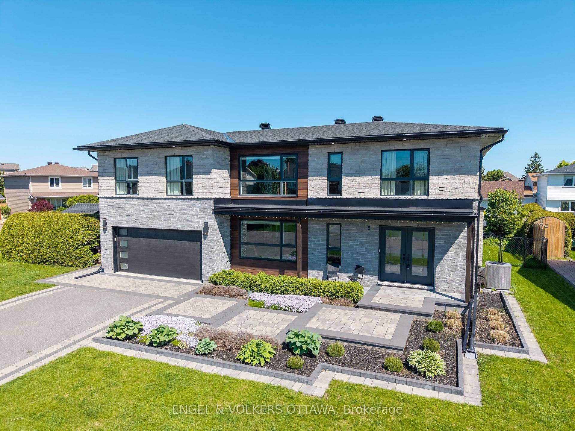 Welcome to 8 Roselawn Court a stunning custom built luxury home in the highly sought after Craig Henry neighborhood.