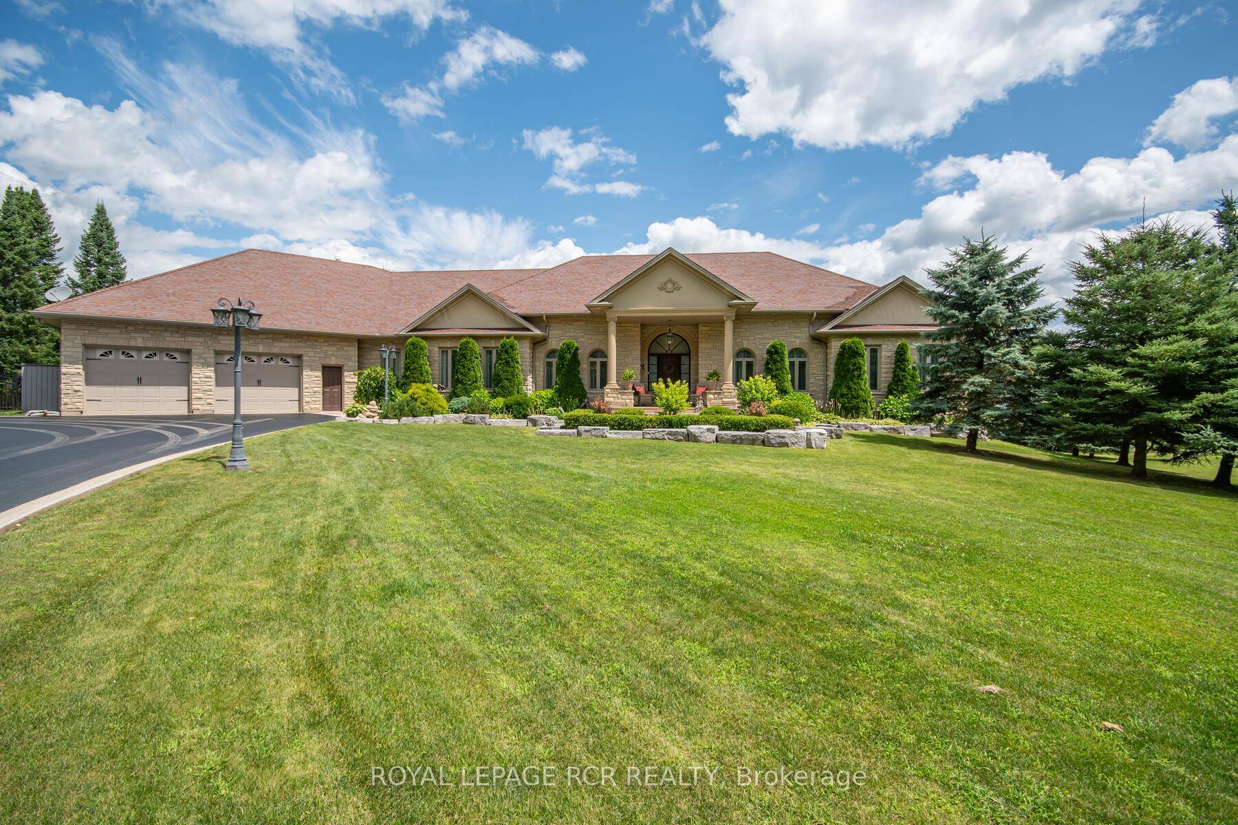 Welcome to this stunning multi generational country property situated on 44 acres near Acton.