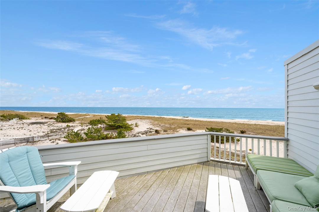 Enjoy expansive views from this oceanfront, top floor, corner unit at the Yardarm Condominiums in Westhampton Beach.