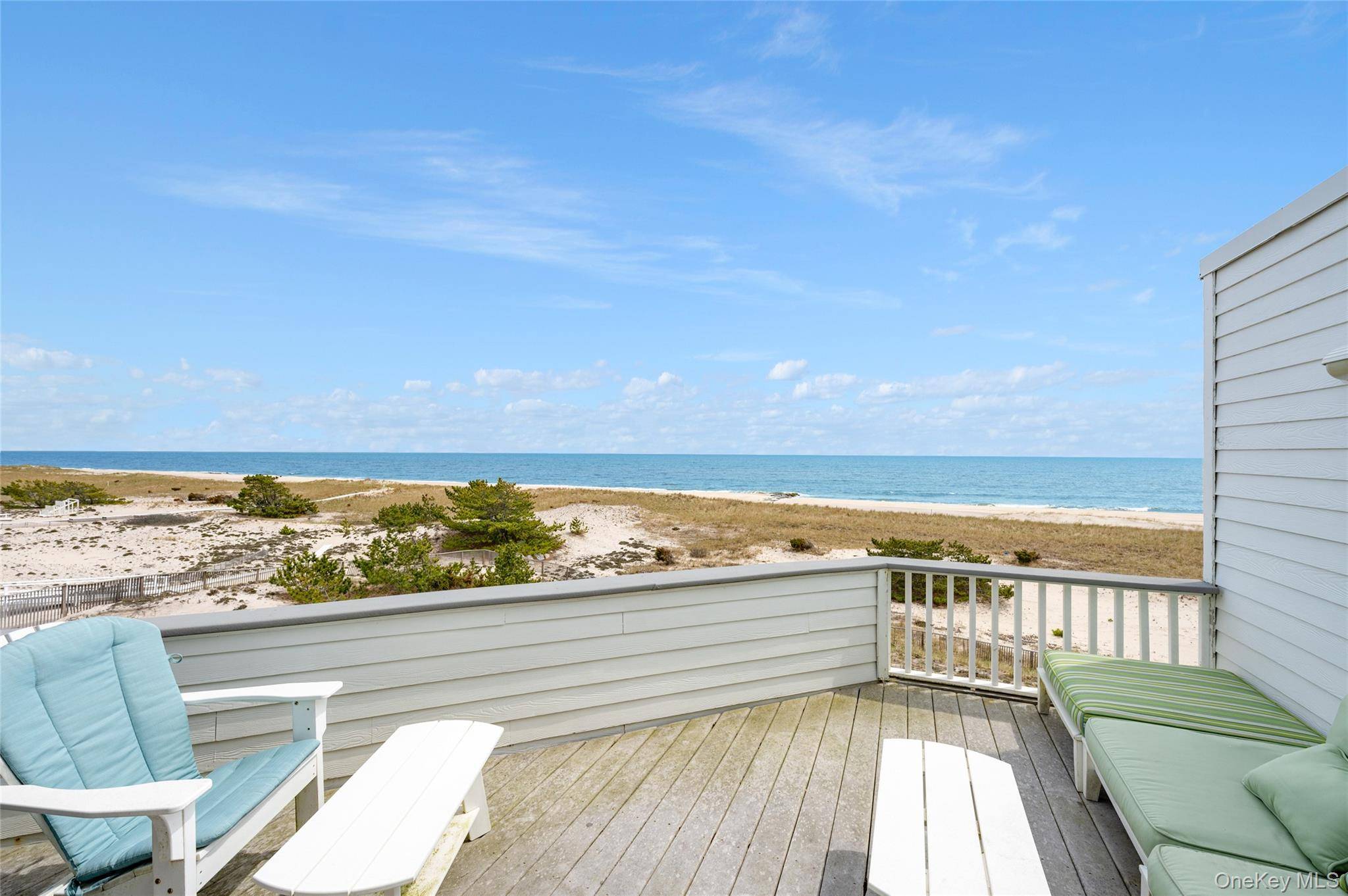 Enjoy expansive views from this oceanfront, top floor, corner unit at the Yardarm Condominiums in Westhampton Beach.