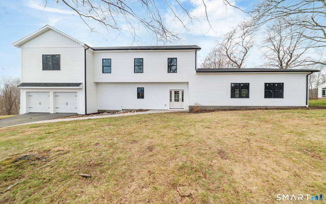 Experience elevated luxury in this exceptional new construction residence in the prestigious Country Club Estates neighborhood of Waterbury.