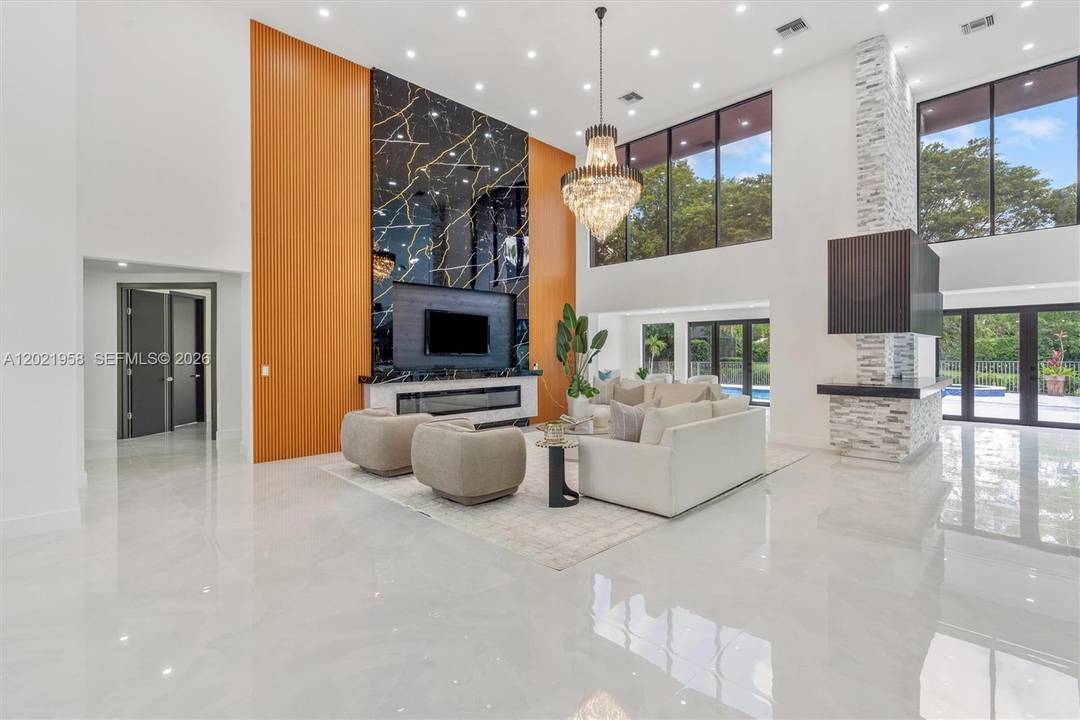 A PARKLAND MASTERPIECE. THIS PARKLAND LAKES FULLY FINISHED FAMILY HOME IN A BEAUTIFUL GATED COMMUNITY.
