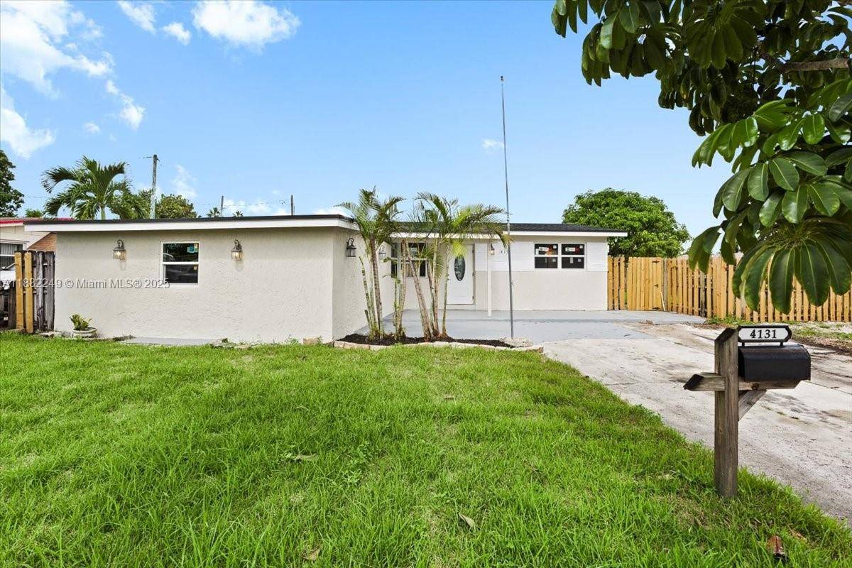 Welcome home ! This 4 bedroom 2 bathroom completely remodeled home features an open concept that flows into the kitchen and dinning area, creating the perfect space for entertaining.