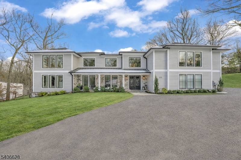A true statement of luxury, this fully reimagined three story Colonial at 315 Freemans Lane sits on a beautifully landscaped one acre property in a premier neighborhood and was rebuilt ...