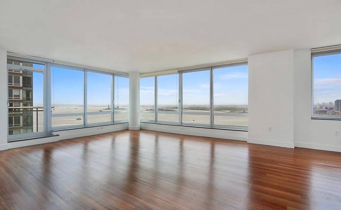 NEW TO MARKET ! MOST COVETED SOUTH WEST CORNER THREE BEDROOM HOME AT THE BEAUTIFUL MILLENNIUM TOWER RESIDENCES.