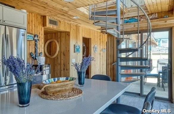 Centrally located, just 5 minutes from the beach and downtown, this 5 bedroom, 3 bath home offers a true resort hotel feeling.