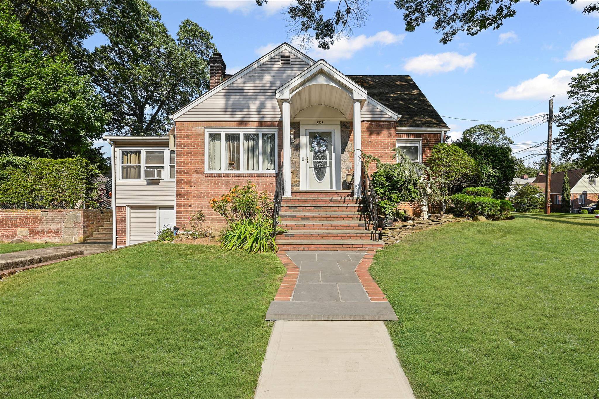 Live, Gather, and Grow in this beautifully updated home nestled in one of West Hempstead s most welcoming neighborhoods !