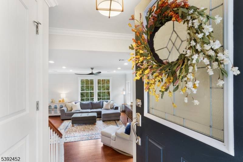 Welcome to 101 Highland Trail, a stunning 10 years young custom home offering luxury, function, and timeless style in one of Denville's most desirable lake communities.