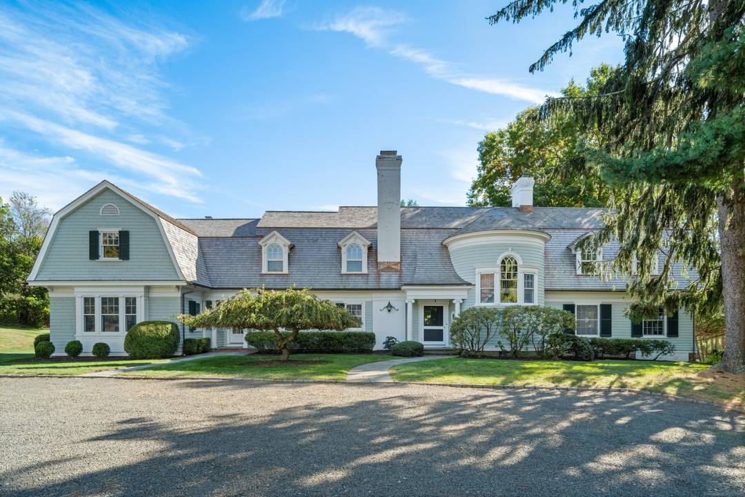 THE BEDFORD HOUSE Architecturally and historically significant estate in coveted Greens Farms.
