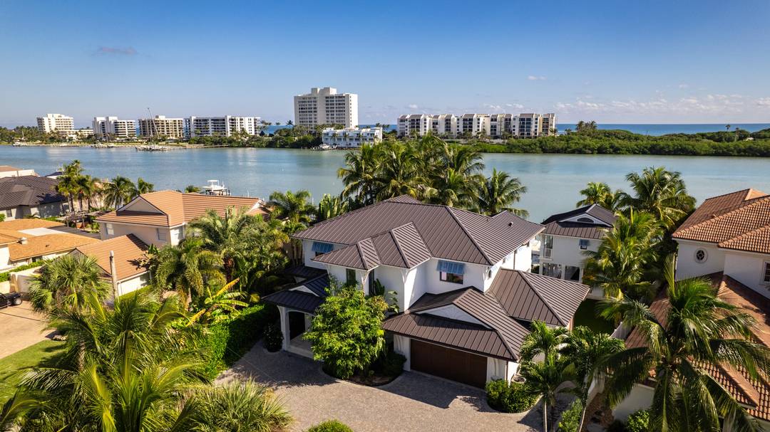 Welcome to this truly one of a kind, brand new build in your very own tropical enclave surrounded by deep Bahamian blue water overlooking Jupiter Island and just minutes from ...