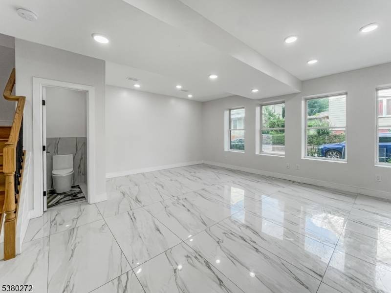 PREPARE TO BE WOWED ! This stunning, newly crafted duplex offers modern luxury and elegant design across two spacious levels.