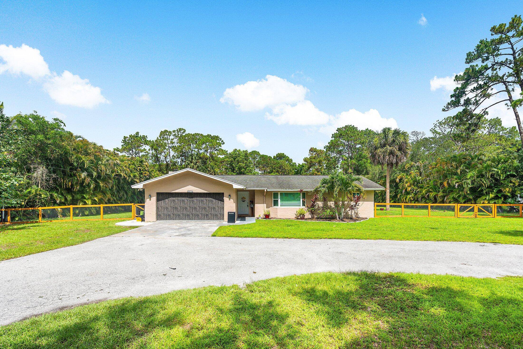 If your looking for an amazing Acreage home look no further than this stunning ranch style home.