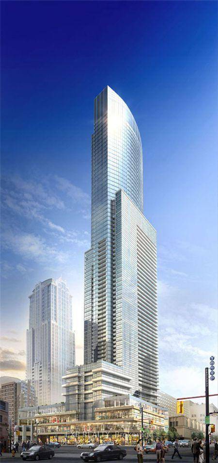 Experience luxury urban living in this spacious 1056 sq ft fully furnished 2 bedroom den corner suite at Aura, one of Toronto's most prestigious addresses.