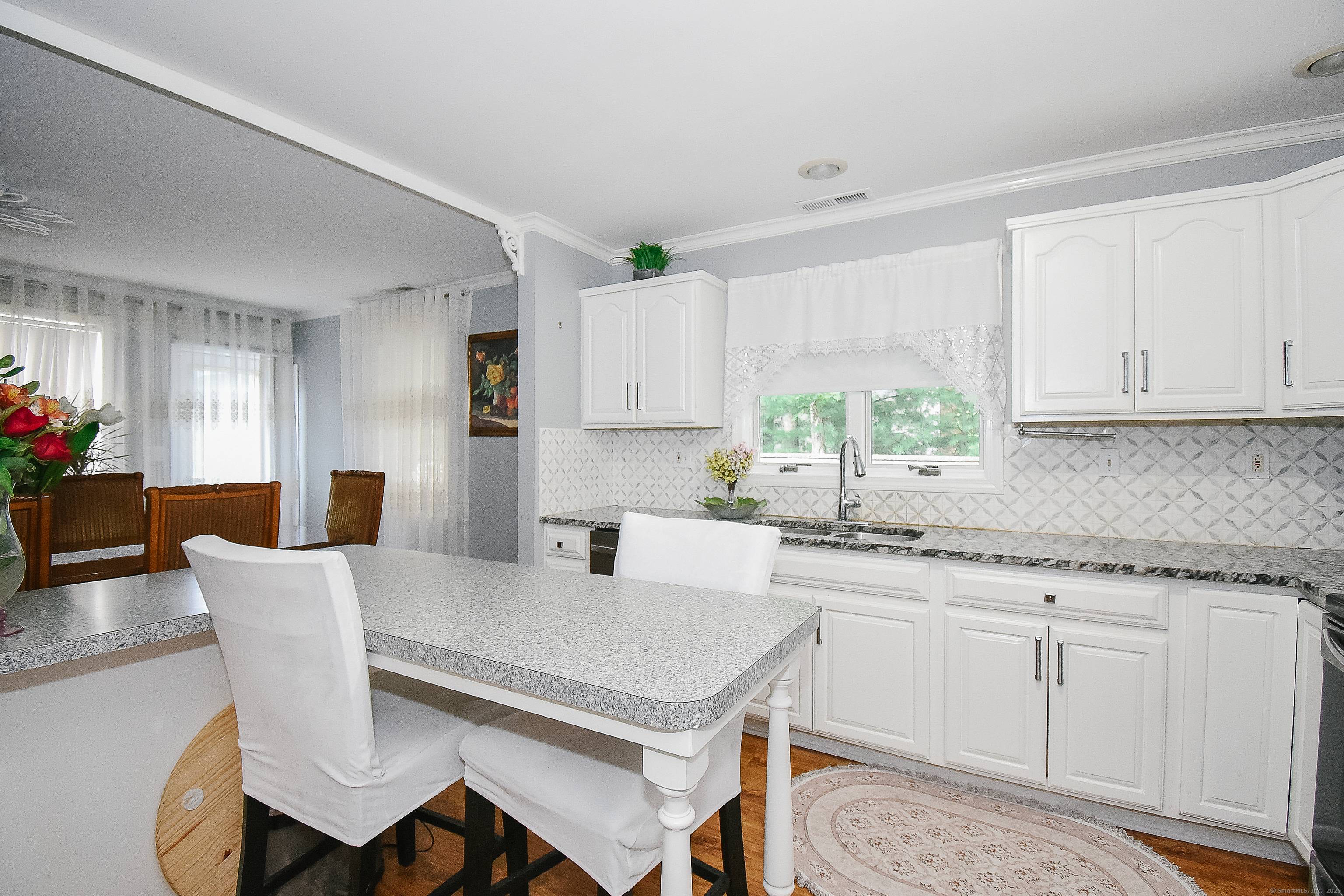 Built in 2004, this wonderful home offers a tranquil retreat with convenient access to I 84 and I 691.