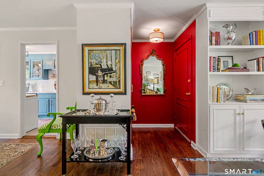 Experience the best of New Canaan living in this impeccable first floor corner unit condominium in one of Fairfield's County's most sought after communities.