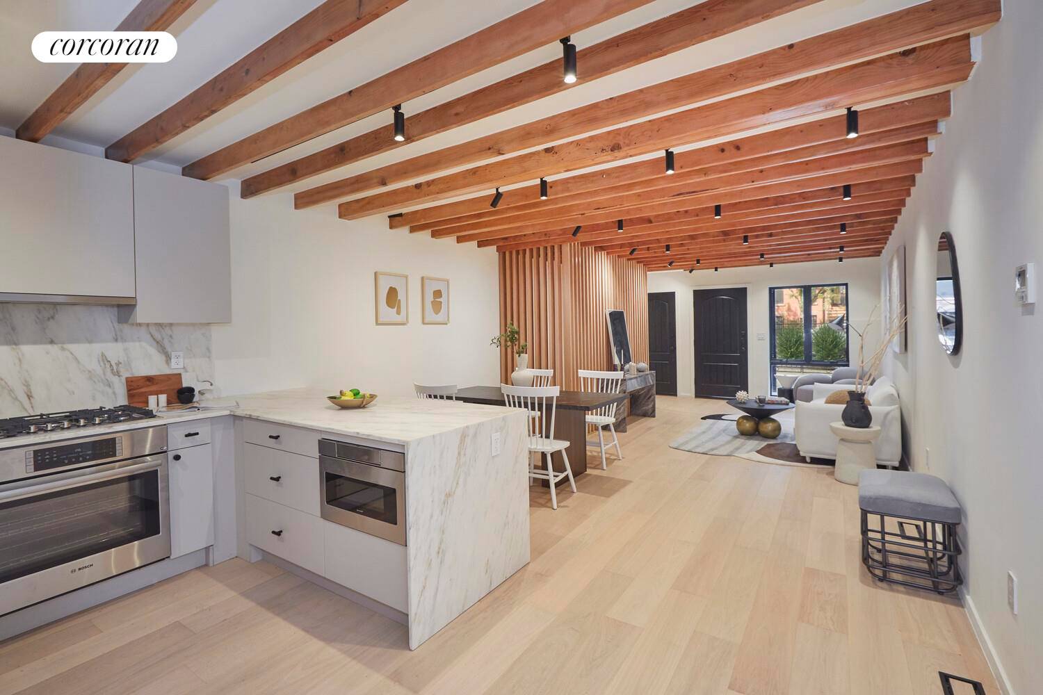 Welcome to the ultimate brownstone meets loft duplex an expansive 1, 950 sq ft home with deeded front parking and a private backyard.