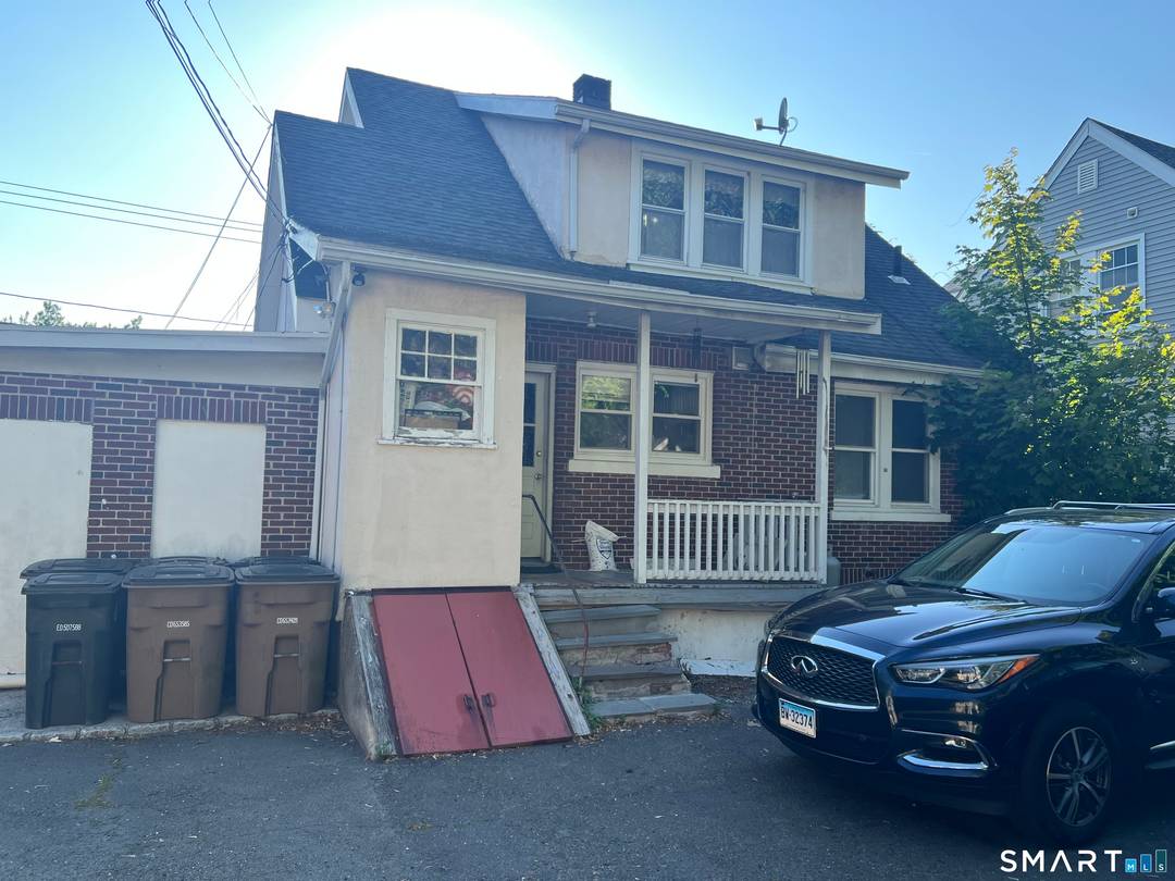 Investment Opportunity ! 275 Long Ridge Road is a legal 4 family, non conforming property w separate structures in the Bulls Head section of Stamford.