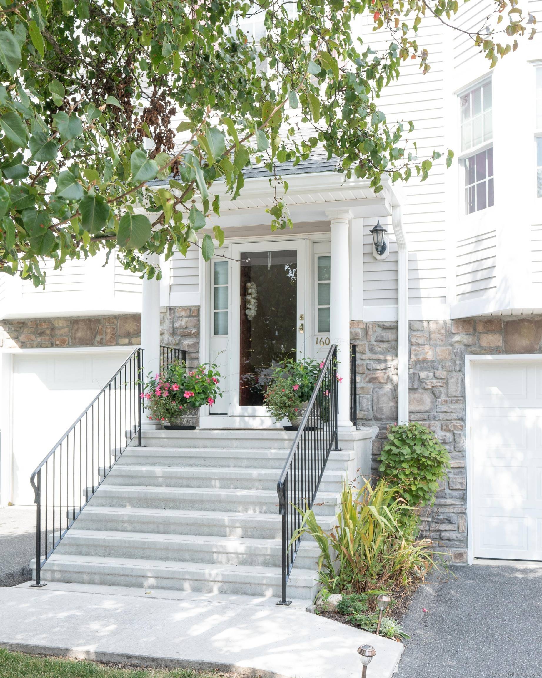 This tastefully updated town home in desirable Sterling Woods has quality design enhancements elevating the home experience.