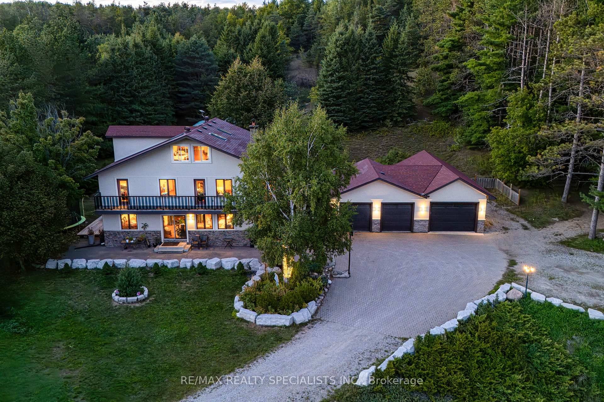 Magnificent estate style home on over 17 Acres of land, offering the perfect blend of luxury, nature and convenience.