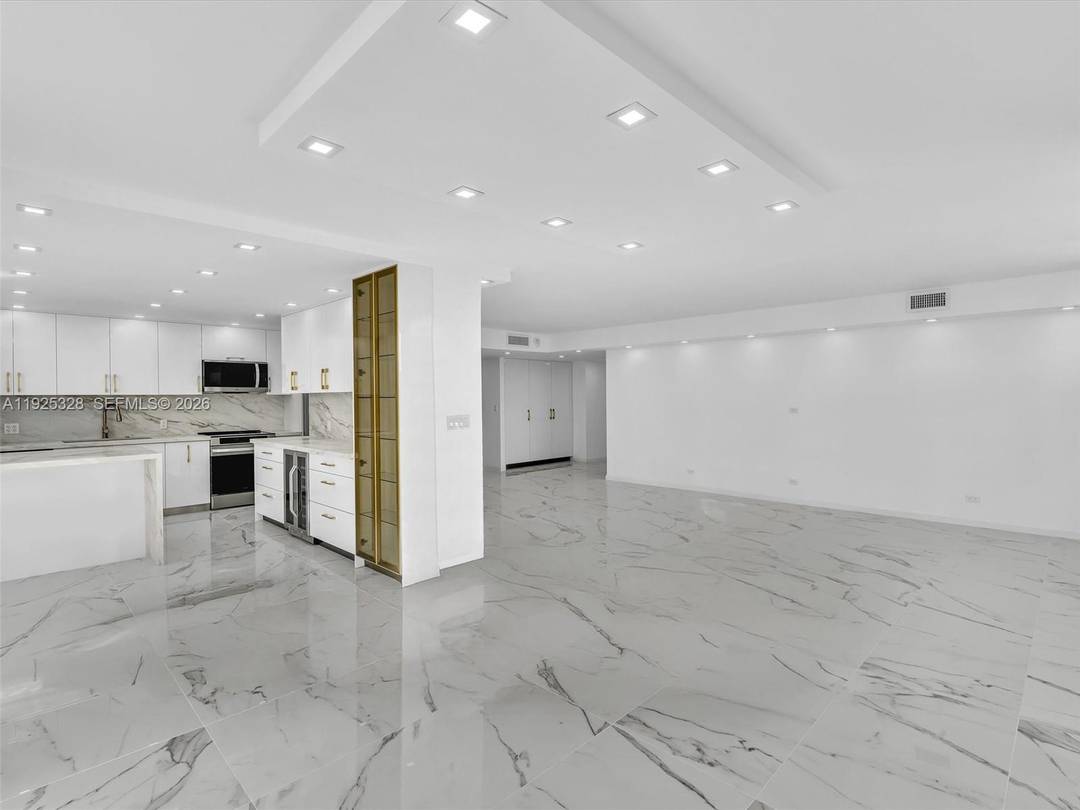 Step into luxury living in this fully remodeled corner 2 bedroom, 2 bath residence featuring the largest 2 bedroom floor plan in the entire Winston Towers community.