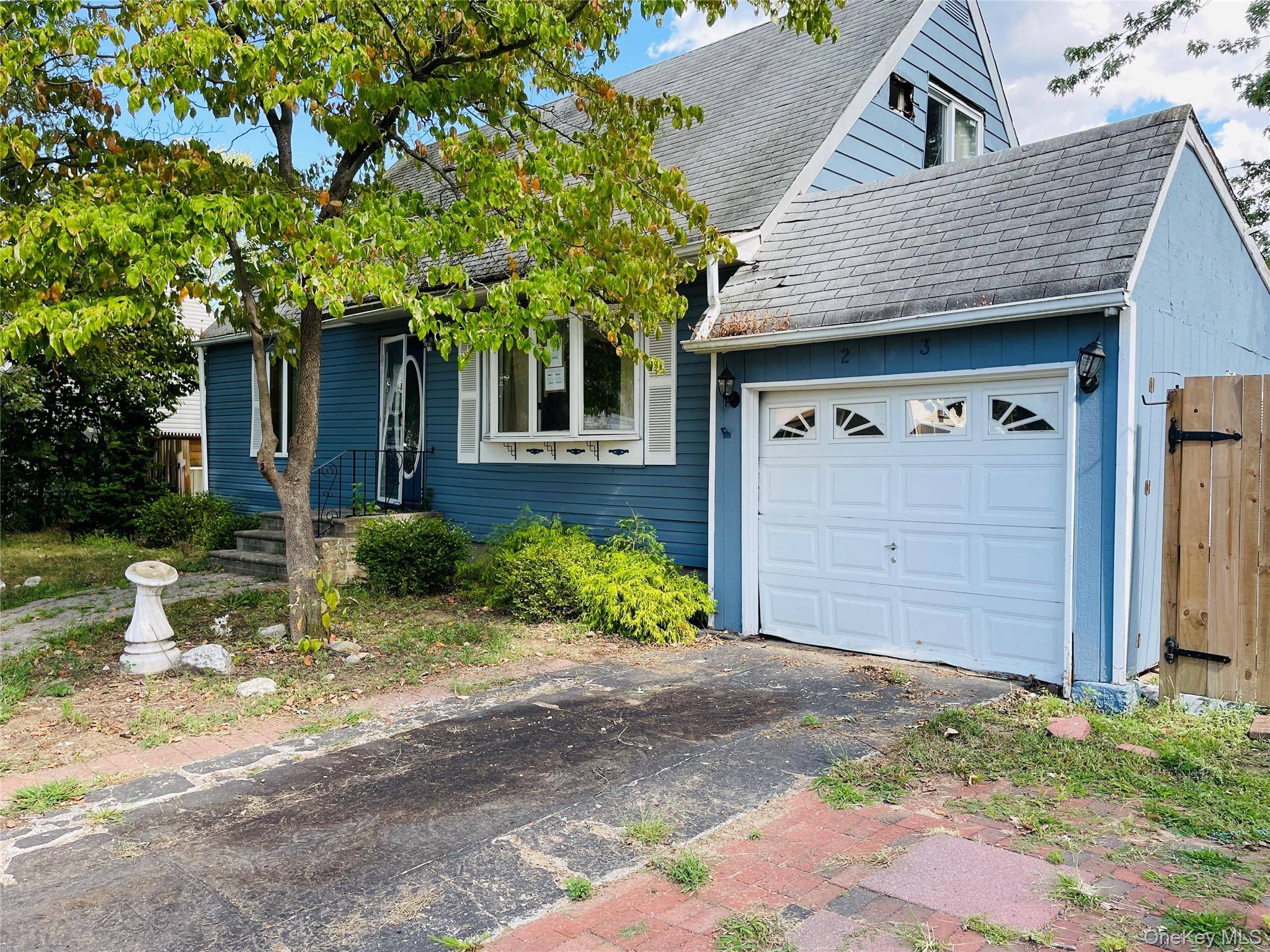 Discover the potential in this spacious 5 bedroom, 2 bathroom home located in the heart of Centereach.