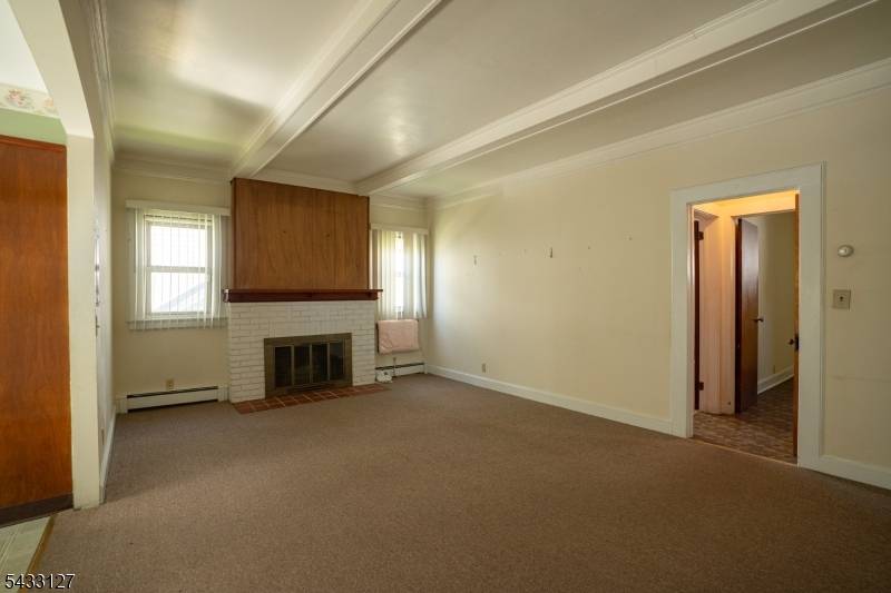 Well maintained two family home on desirable Kearny Ave featuring two 1 bedroom units and 3 full baths.