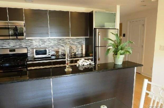TOP Floor 6th Floor, Corner Unit Condo in the Heart of Briarwood !
