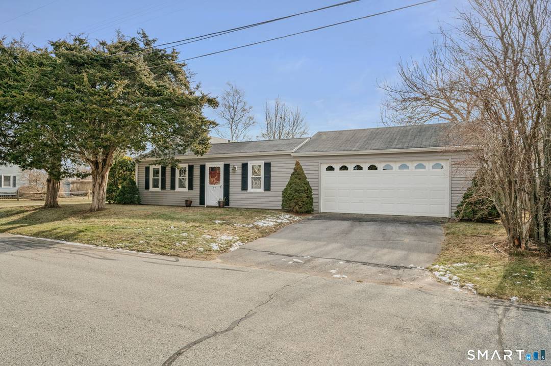 Charming 2 bedroom 1 bath ranch style home in Black Point Beach Club situated on a double lot offering loads of possibilities and located just up the street from the ...