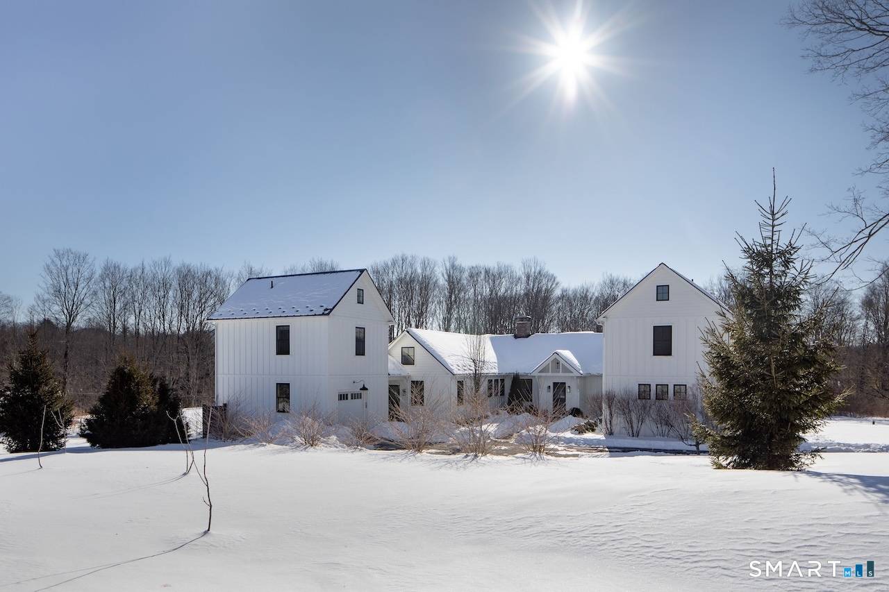 Set on three pastoral acres in a private setting, this modern farmhouse offers timeless craftsmanship paired with thoughtful contemporary design.