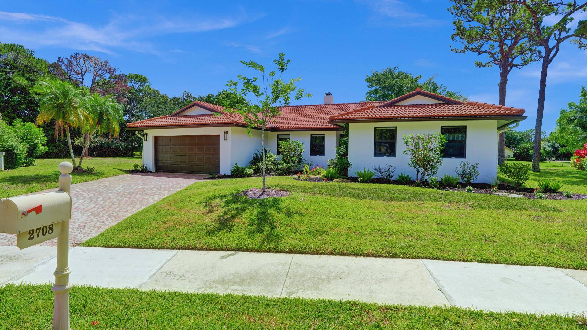 Serenity meets sophistication with this lakeside luxurious, renovated retreat with private pool paradise in Timbercreek one of Boca Raton's most picturesque and sought after communities.