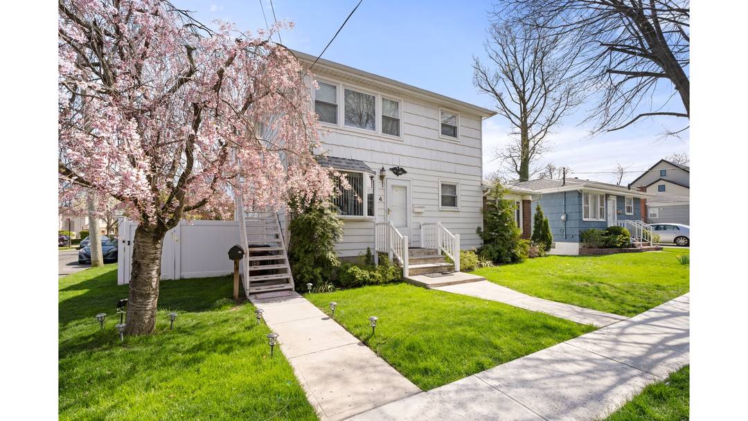 Welcome to 4 Cottage Avenue, a fully detached two family home ideally positioned on a corner lot in the heart of Great Kills, Staten Island.