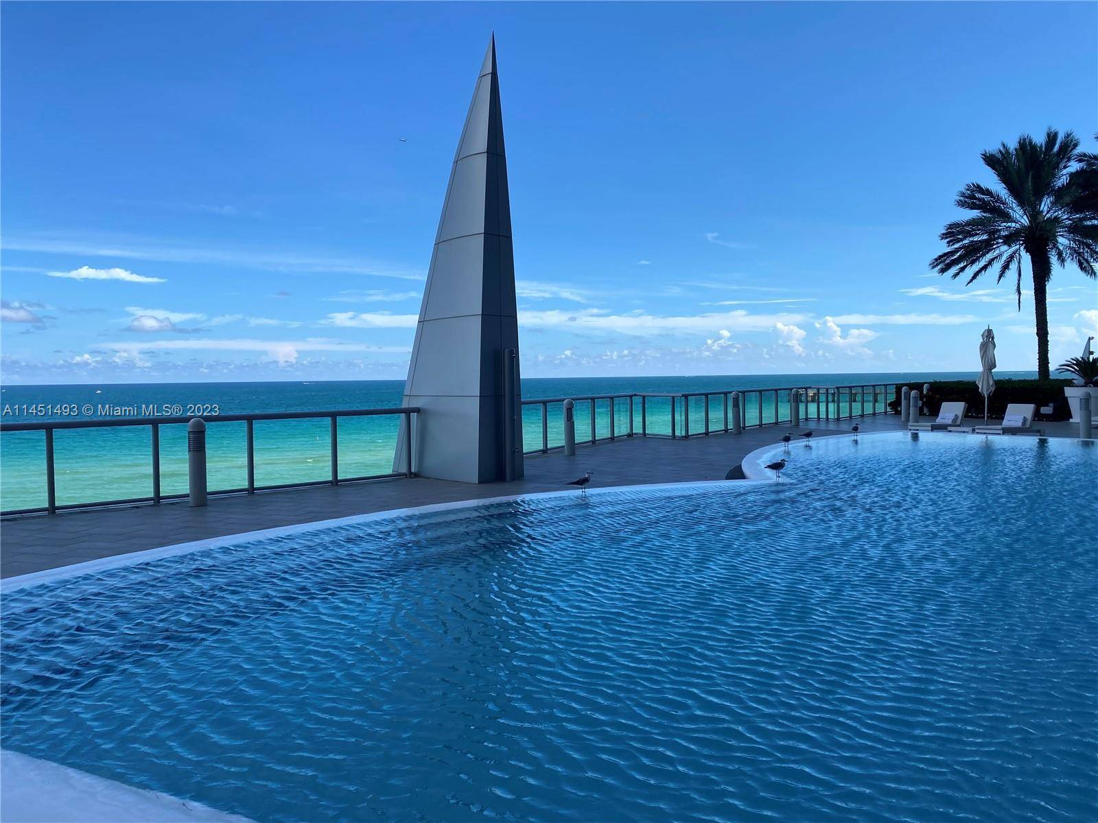 LUXURY CONDO WITH SPECTACULAR OCEAN VIEW, 2 BED DEN CONVERTED IN THE THIRD BEDROOM WITH FULL BATH INCLUDED.