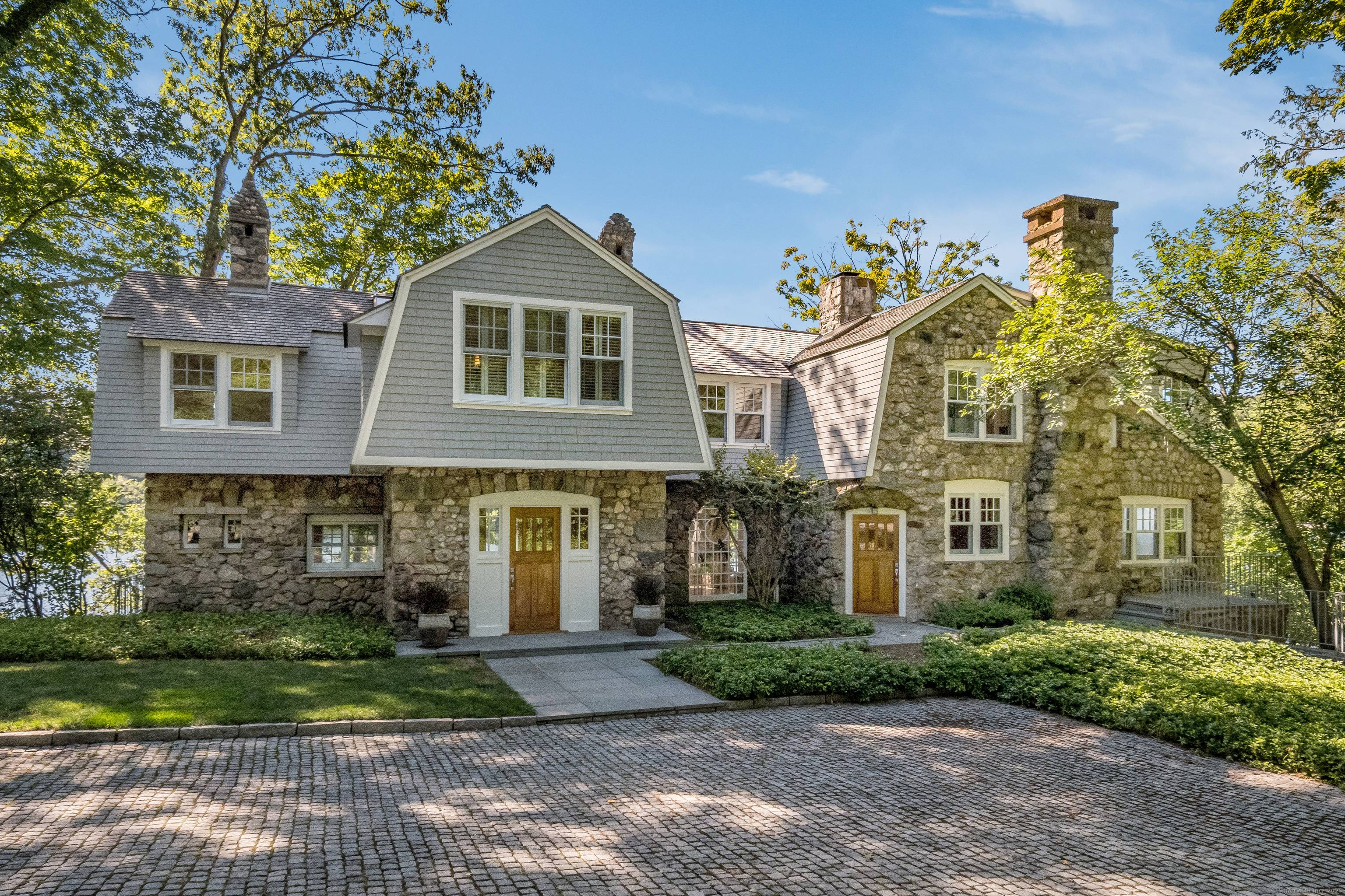 A Rare Opportunity on Lake Quonnipaug Experience waterfront living at its finest with this architecturally remodeled masterpiece, featuring a private dock and direct access to Guilford's most coveted destination Lake ...