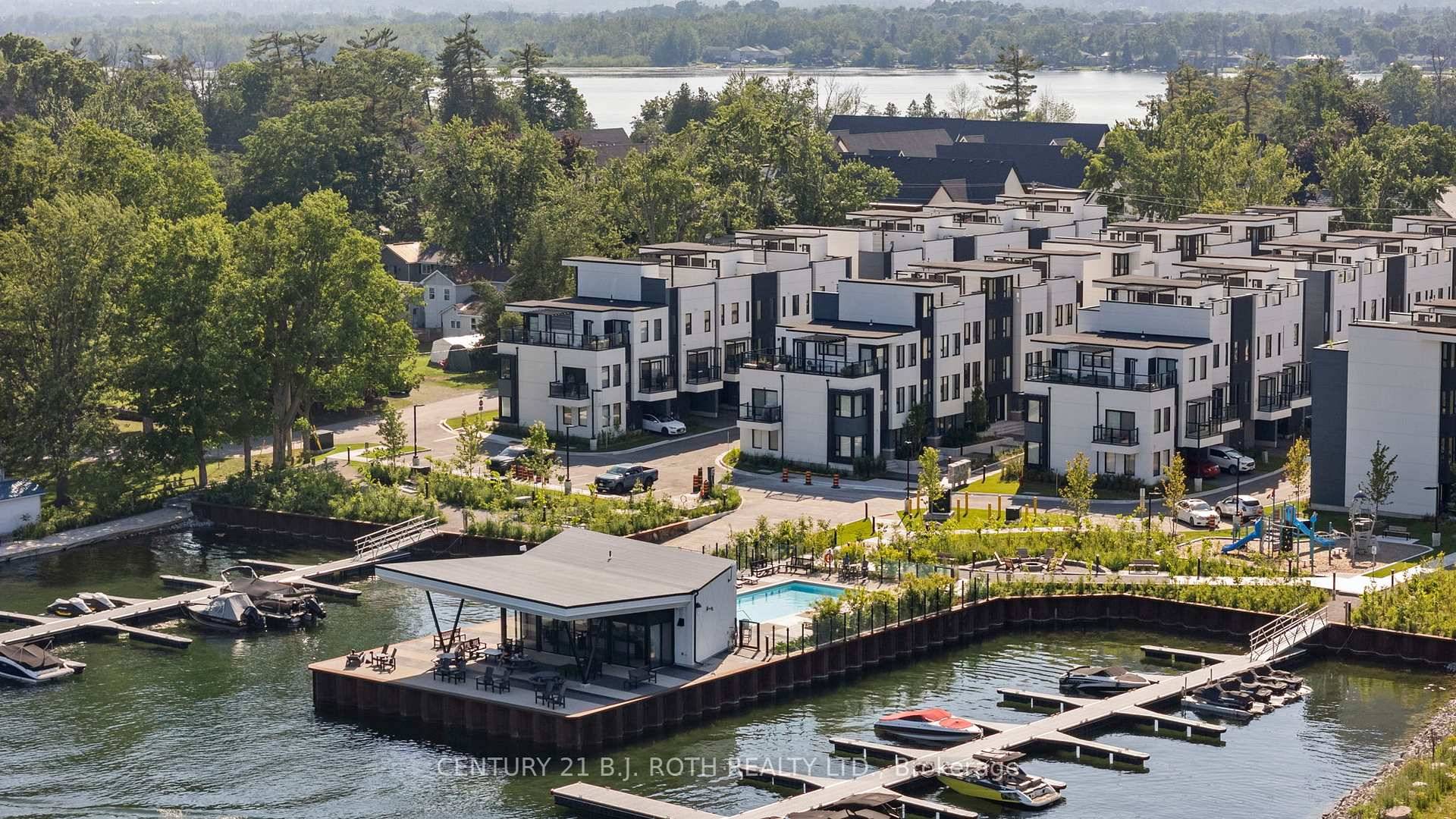 Welcome to 8 Bru Lor Lane, Orillia's most prestigious lakefront community Mariners Pier, where elegance, tranquility, and modern sophistication converge.