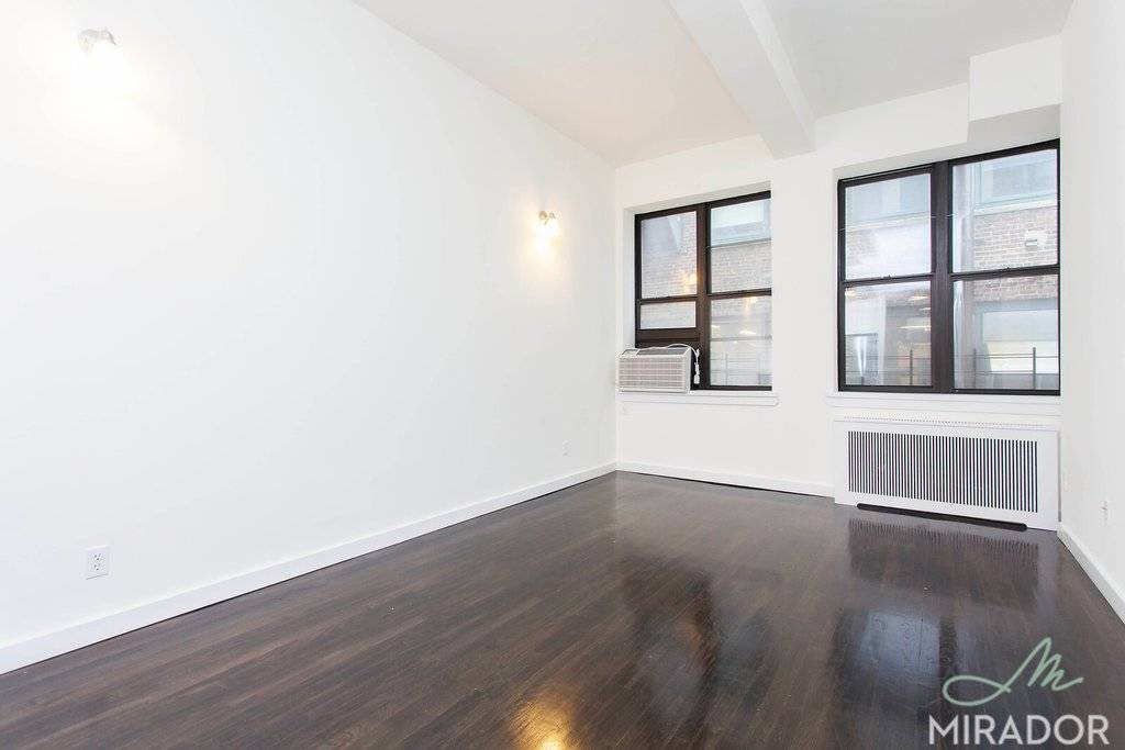 This modern, renovated, two bedroom home is perfect for entertaining with high ceilings and hardwood floors throughout.
