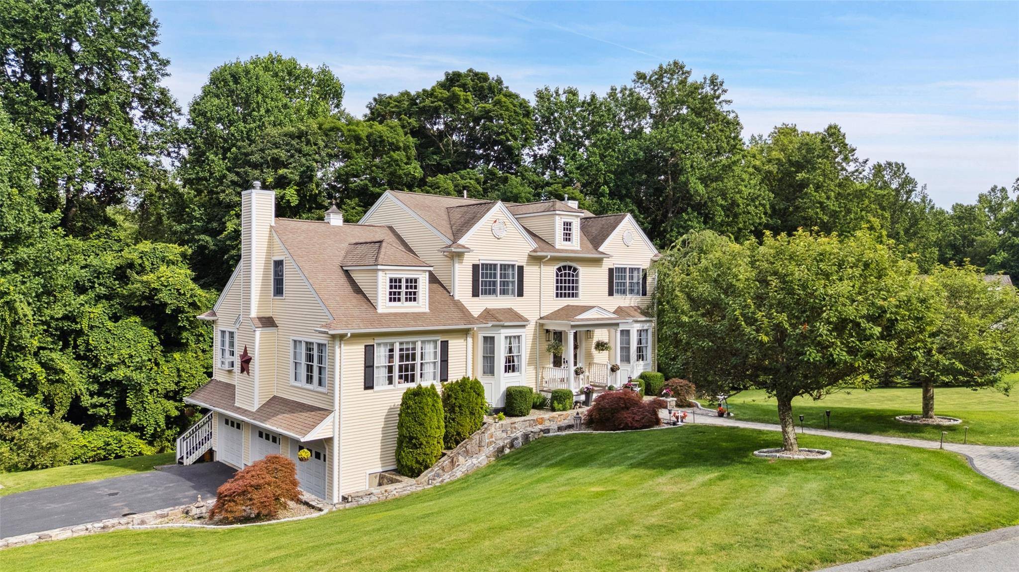 Welcome to this absolutely stunning four bedroom Colonial, perfectly situated on a peaceful cul de sac and set on over two beautifully landscaped acres.