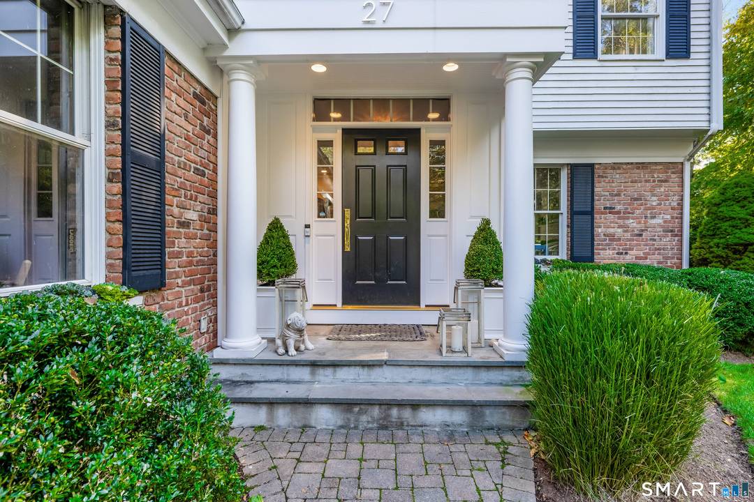 Tucked away on a quiet cul de sac in the sought after Ox Ridge school district, this beautifully updated 4 Bedroom, 2.