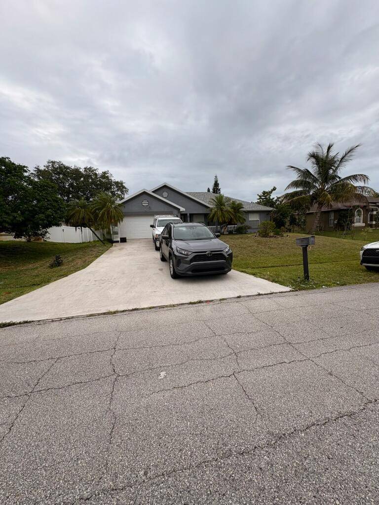 Welcome to this charming 3 bedroom, 2 bathroom single family home in Port St.