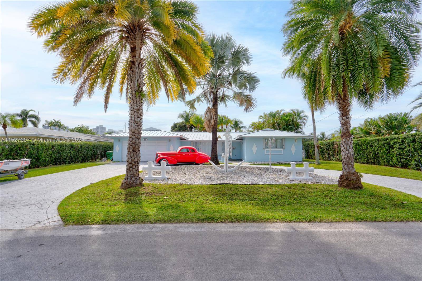Welcome to your dream home in prestigious Golden Isles Estates, Hallandale Beach !