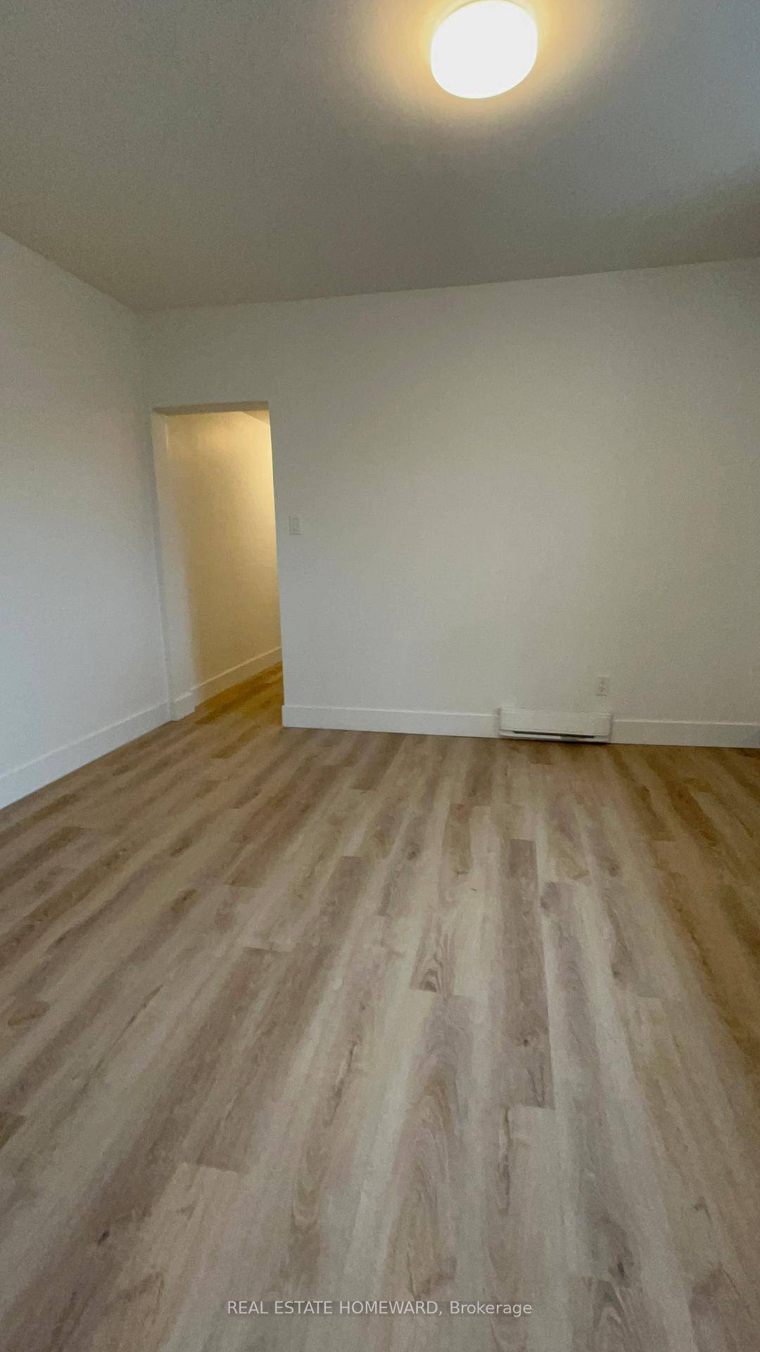 Spacious 2 bedroom, above a store in heart of Gerrard E.