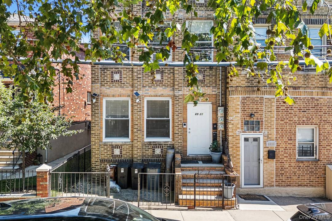 Welcome to 6921 78th St a beautifully remodeled two family brick home that blends style, comfort, and convenience.