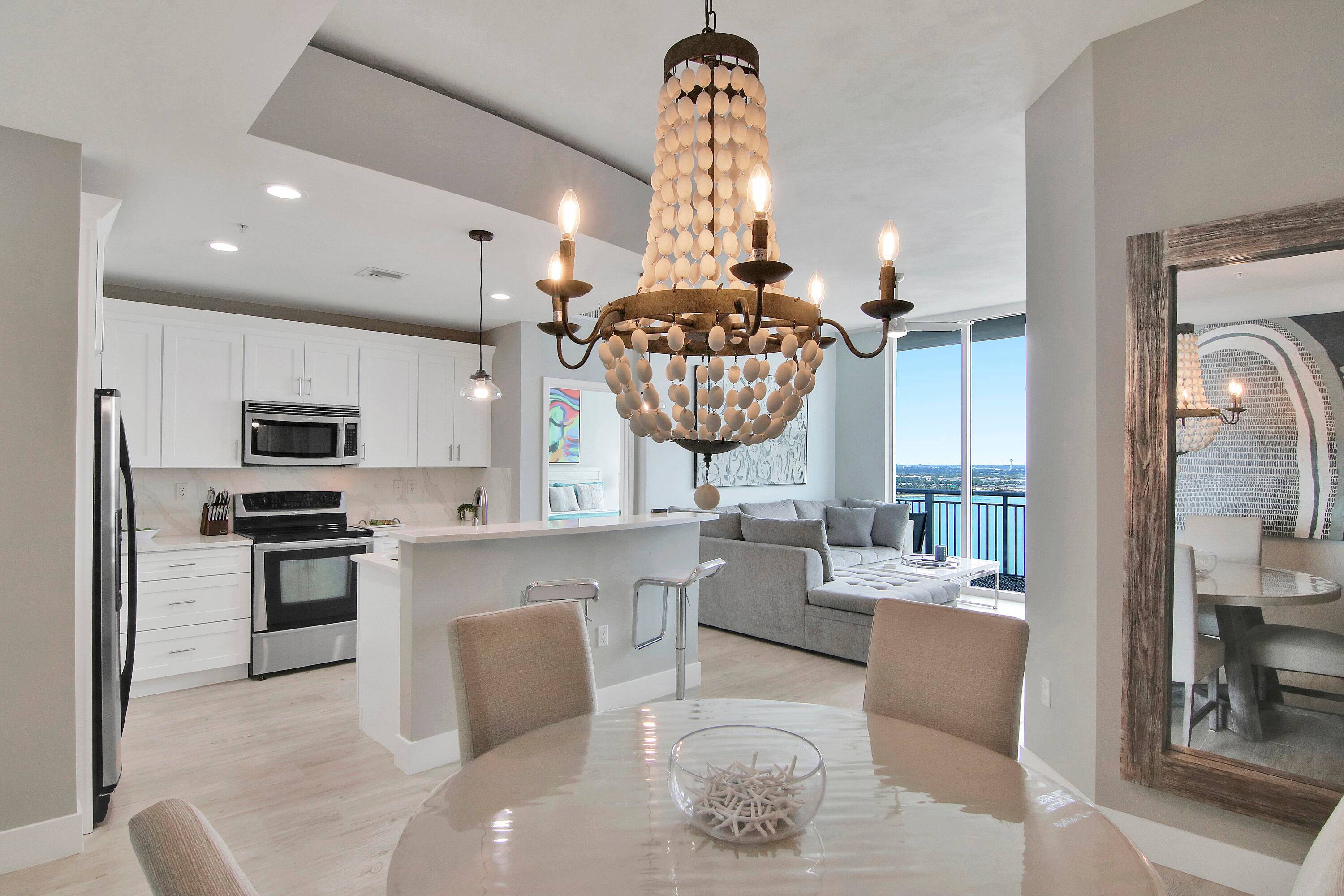 Stunning waterfront industrial loft style living at the Edge Condo in the heart of Downtown West Palm Beach.