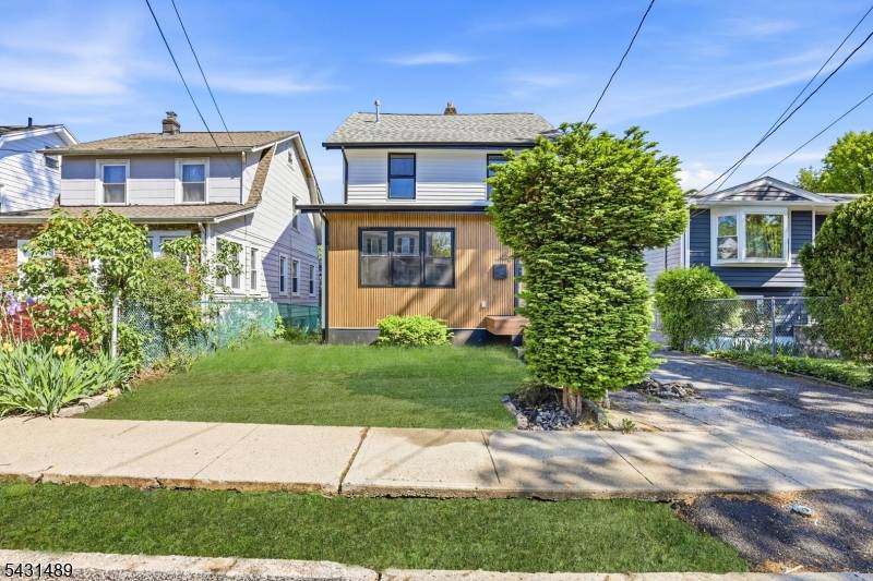 Welcome to 1439 Compton Ter, a beautifully renovated Colonial blending modern style, spacious living, and thoughtful design in Hillside.
