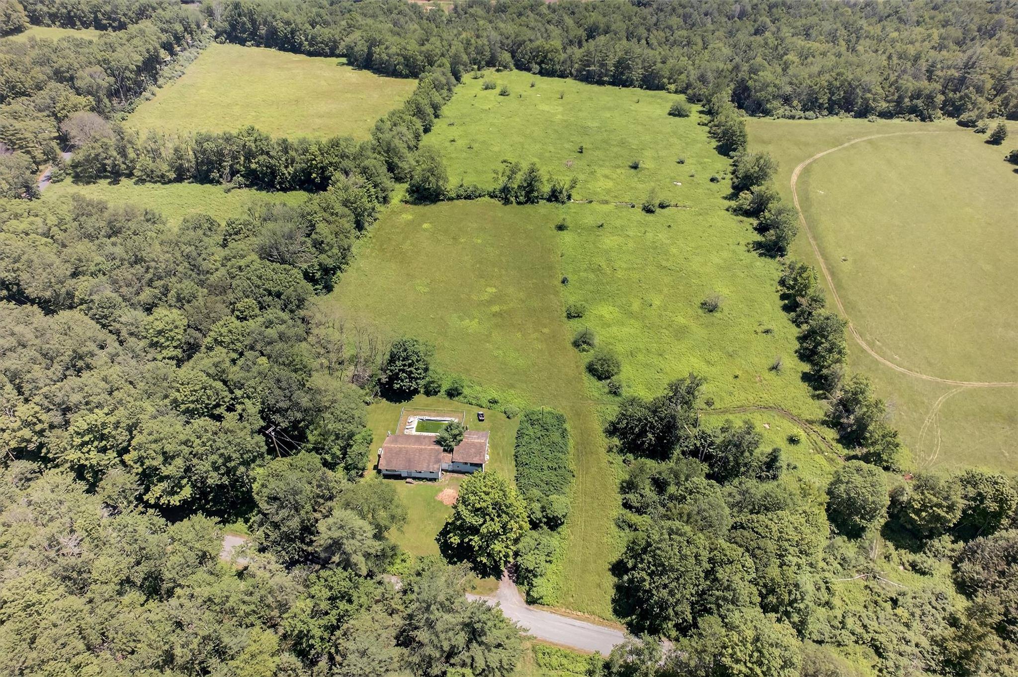 14 Beautiful Acres on Quiet Country Road Ideal for Horses, Farming, or Your Private Retreat.